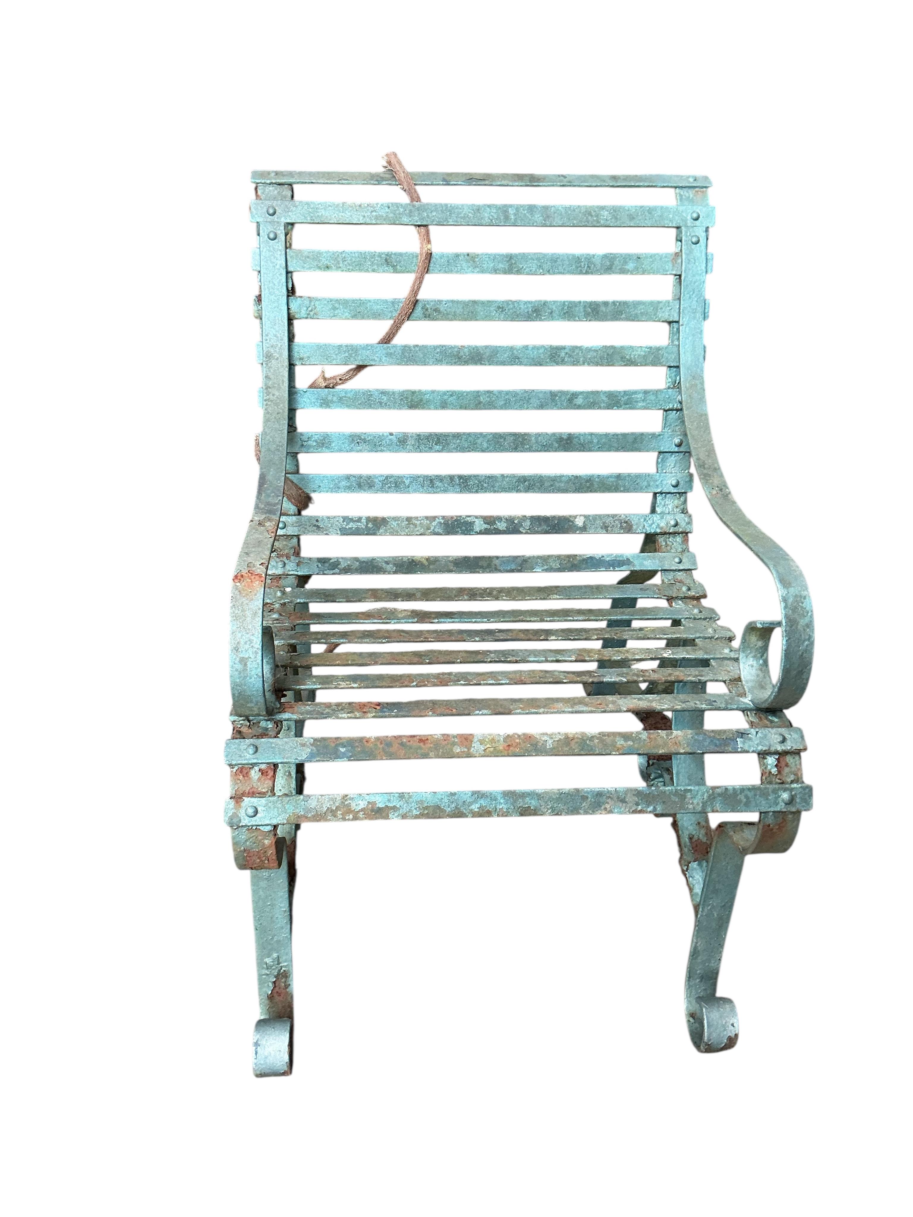 A pair of Victorian painted, wrought iron garden chairs, width 56cm, depth 74cm, height 84cm